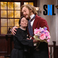 Cover for Saturday Night Live with Rachel Dratch as Jane Eyre and Jude Law as Mr. Rochester. Jane and Rochester are hugging with flowers. The SNL logo is in the corner. 